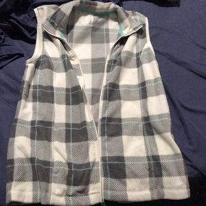 warm no sleeve zip up. (never worn)